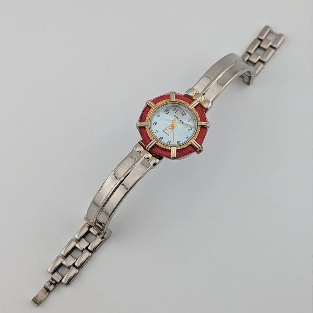 Gruen CR7183 Mother‎ of Pearl Dial Red lucite Bezel Two Tone Bangle Watch